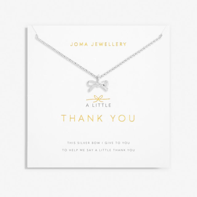 Our A Little Thank You Necklace features an elegant silver-plated chain and a sparkling bow charm. Perfectly presented on one of our signature stylised cards and framed by a sweet sentiment. This piece was made to be cherished now and for years to come.