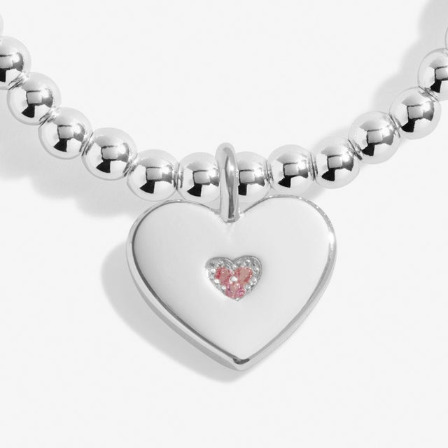 silver bracelet heart charm with little pink heart inside of charm, cute gift for mum from  daughter