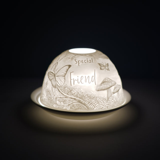 Cello porcelain tealight holder dome, in our special friend woodland pattern design. This design displays the text special friend over a woodland backdrop with wild mushrooms and flowers. We offer a wide range of porcelain tealight holders to let you choose your show stopping piece.