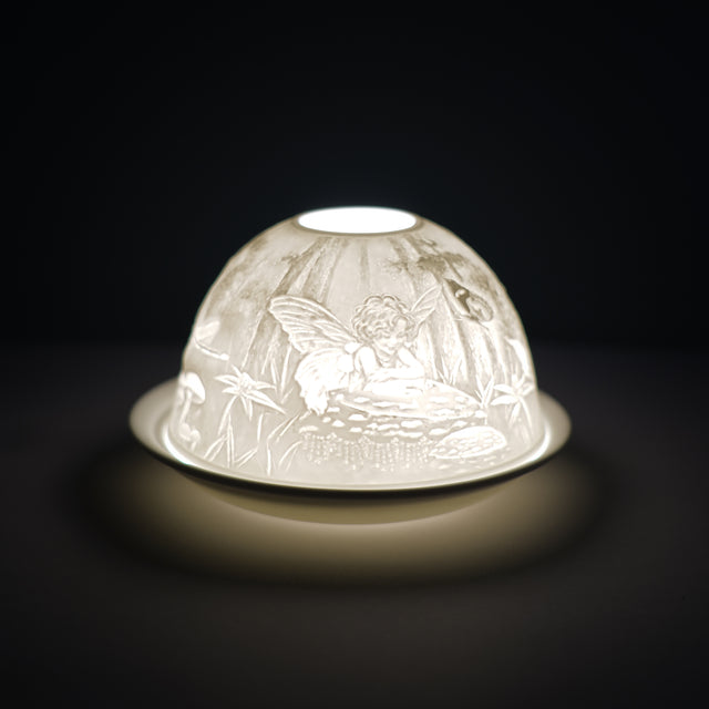 Cello porcelain tealight holder dome, in our Fairy Design. This design displays a fairy surrounded by nature. We offer a wide range of porcelain tealight holders to let you choose your show-stopping piece!