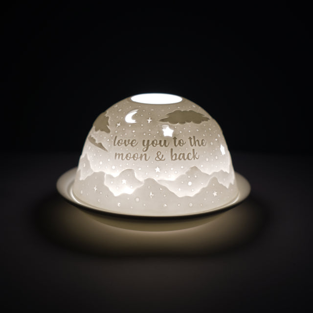 Cello porcelain tealight holder dome, in our To The Moon and Back design. This design displays a starry nice with the text love you to the moon and back. Pair with tealights or LED lights.