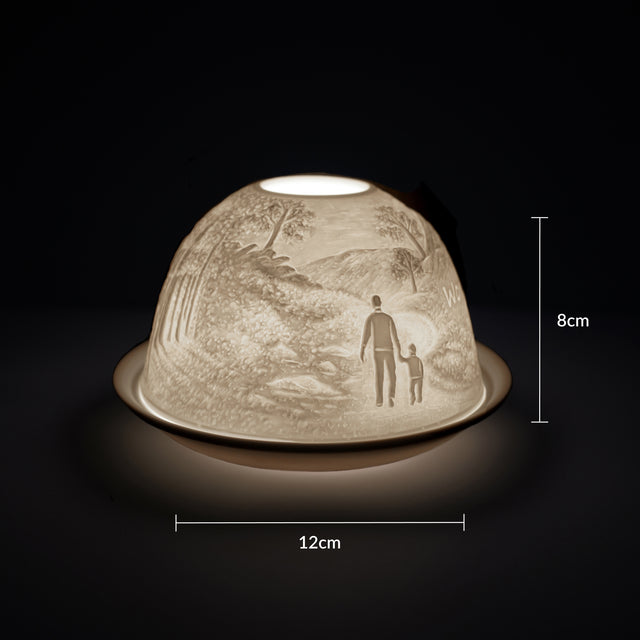 Cello porcelain tealight holder dome featuring a father and child surrounded by wilderness with the text 'World's Best Dad.' Dimensions: 8cm height, 12cm width, displayed against a dark background.
