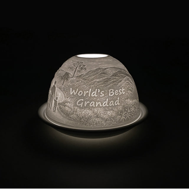 Cello porcelain tealight holder dome, in our Worlds Best Grandad design. This design displays an image of a grandfather and child surrounded by wilderness with text displaying Worlds Best Grandad. We offer a wide range of porcelain tealight holders to let you choose your show-stopping piece.