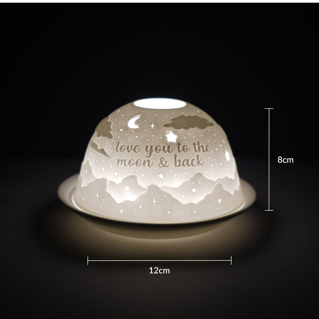 Cello porcelain tealight holder dome featuring a starry night design with the text 'Love You To The Moon and Back.' Dimensions: 8cm height, 12cm width, displayed against a dark background.