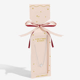 Joma Jewellery necklace in a decorative box with 'Christmas Wishes' text on a cracker