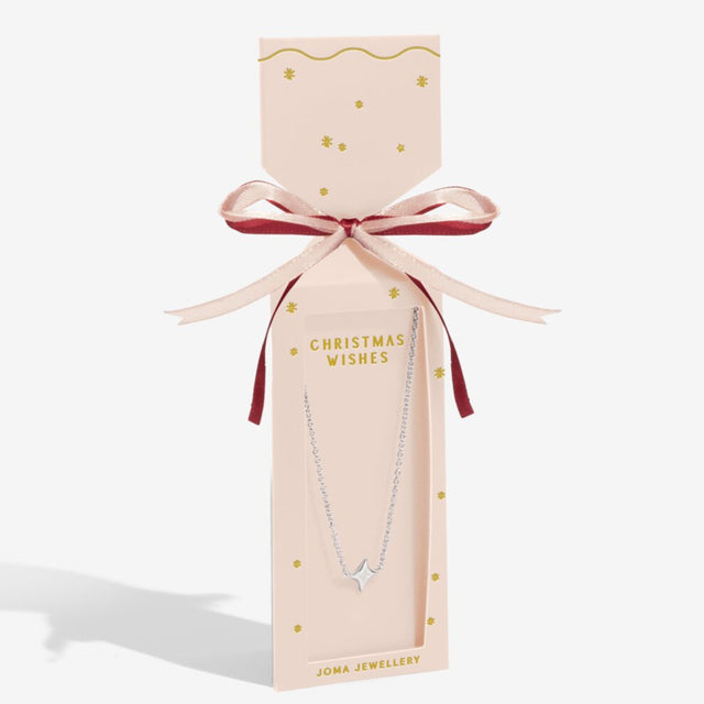 Joma Jewellery necklace in a decorative box with 'Christmas Wishes' text on a cracker