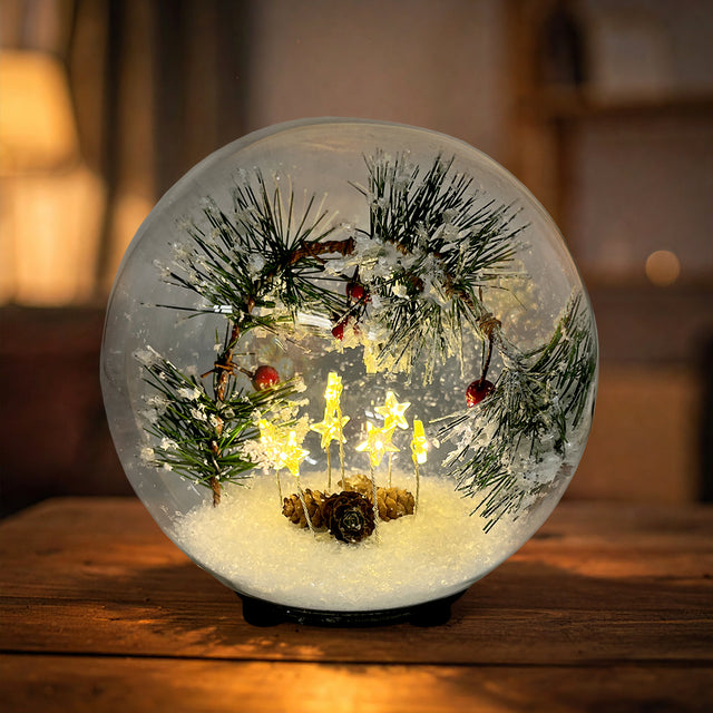 Large Gleneagles Star Garland LED USB Glass Lamp illuminating a modern living room display with soft, star-shaped LED light, creating an elegant festive ambience.