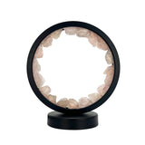 Front view of the Gleneagles Circle Earth LED Lamp in rose quartz, showing its circular design and soft pink crystal glow.