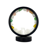 Front view of the Gleneagles Circle Earth LED Lamp in mixed mineral, showing its circular design and soft colourful crystal glow.