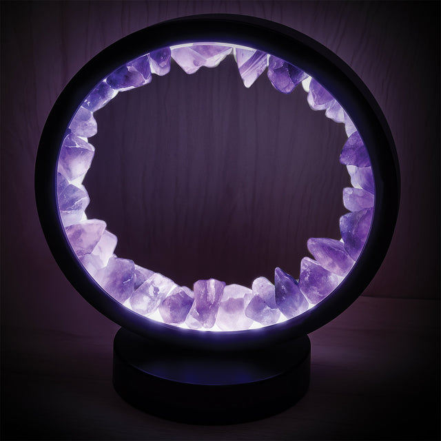 Gleneagles Circle Earth LED Lamp – Purple Fluorite illuminated in a dark room, showing true vibrant purple crystal light and calming glow effect.