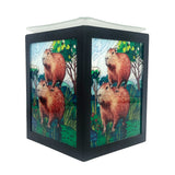 Cello Capybara Electric Melt Burner illuminated, showcasing stained-glass-style light and rustic capybara design for cosy home fragrance.