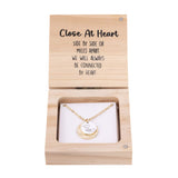 Splosh Heart & Soul Necklace – Close At Heart displayed in an open wooden gift box with gold-plated necklace and “Close at heart” message card inside.