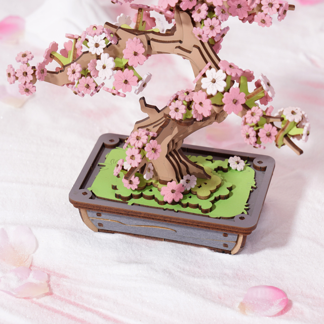 3D wooden puzzle of ROBOTIME Rolife Kits Sakura Bonsai on a white background