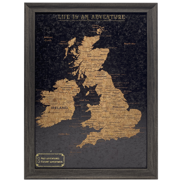 Splosh Travel Map â€“ Small UK & Ireland Map with Black Frame, Gold Land Detail, and Cork Board Backing. Features personalised labels for your pins, tracking past and future travels across the UK and Ireland. Includes 'Life is an Adventure' text and hooks for easy wall mounting, perfect for home dÃ©cor or as a thoughtful gift.