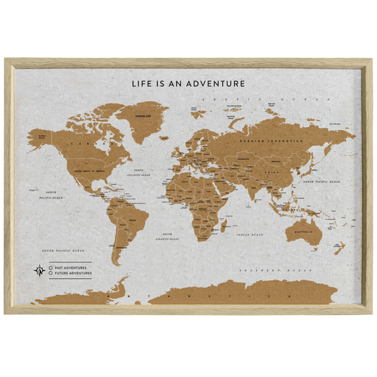Splosh Travel Map – XL World Desk Map with White Frame, Gold Land Detail, and Cork Board Backing. Designed for desk use with a sturdy leg for support and anti-slip material. Features personalised labels for your pins, tracking past and future travels across the world. Includes 'Life is an Adventure' text, ideal for home or office décor