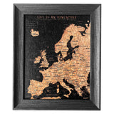 Splosh Travel Map â€“ Europe Desk Map with Black Frame, Gold Land Detail, and Cork Board Backing. Designed for desk use with a sturdy leg for support and anti-slip material. Features personalised labels for your pins, tracking past and future travels across Europe. Includes 'Life is an Adventure' text, ideal for home or office dÃ©cor.