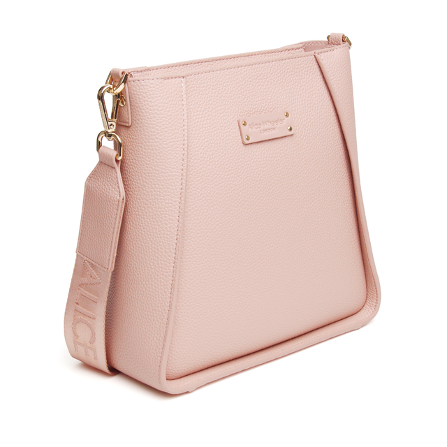 Pink Alice Wheeler women’s crossbody bag with textured vegan leather and signature corner detailing