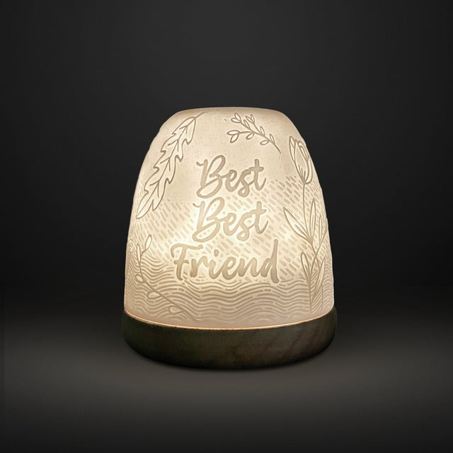 Cello tall tealight dome Best Best Friend design glowing on dark background