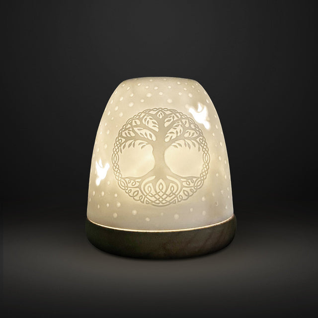 Cello tall tealight dome Tree of Life porcelain holder glowing in dark setting