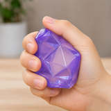 Diamond Cube squishy fidget toy being squeezed in hand for stress relief, anxiety reduction and sensory play
