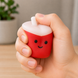 Fast food squishy fidget toy being squeezed in hand for stress relief, anxiety reduction and sensory play