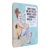 Drinks coasters with illustration of a woman sitting on a couch and humorous text on a light blue background