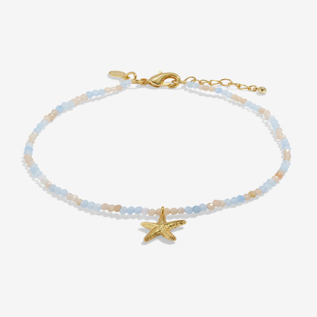 Gold anklet with textured starfish charm and multicolour beads