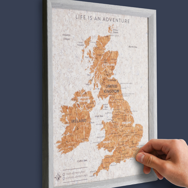 UK and Ireland travel map cork board detail with gold and silver pins