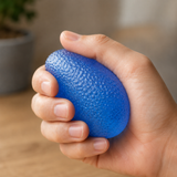 Jelly Drop gel fidget toy being squeezed in hand for stress relief, anxiety reduction and sensory play