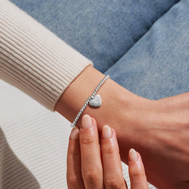 Joma Jewellery sympathy bracelet worn on wrist