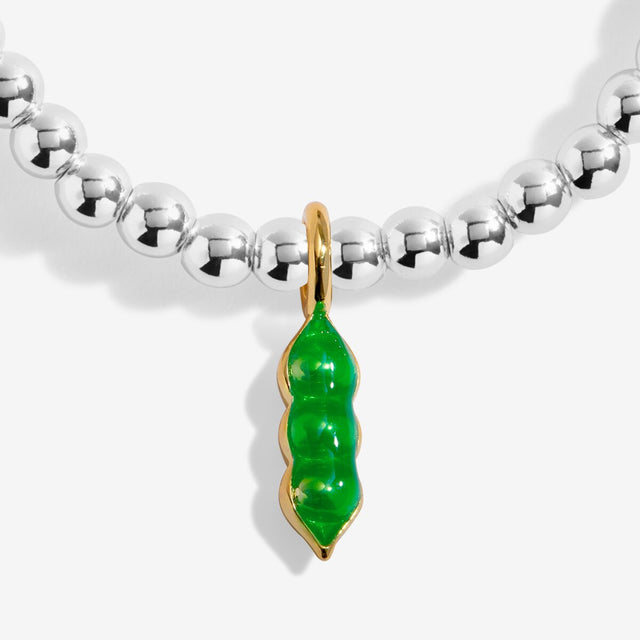 Close-up of pea pod charm on Joma Jewellery A Little Vibes Peas In A Pod silver-plated bracelet