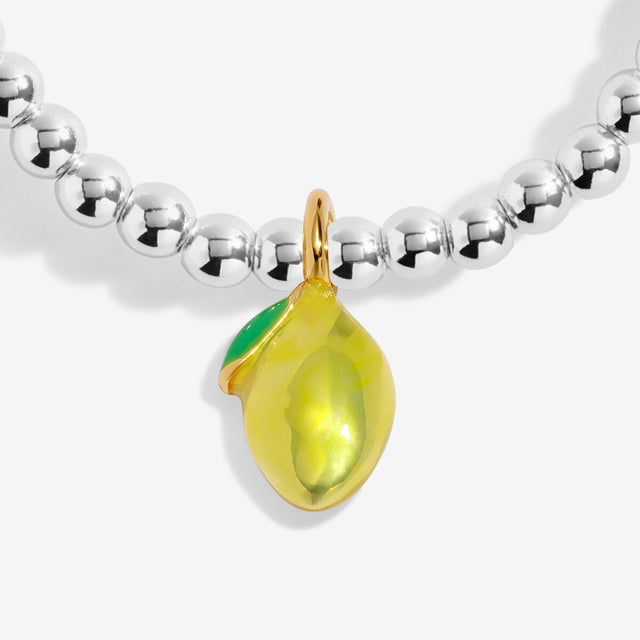 Close-up of lemon charm on Joma Jewellery A Little Vibes The Zest Is Yet To Come silver-plated bracelet