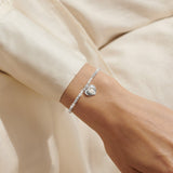 Joma Jewellery April rock crystal birthstone bracelet worn on wrist