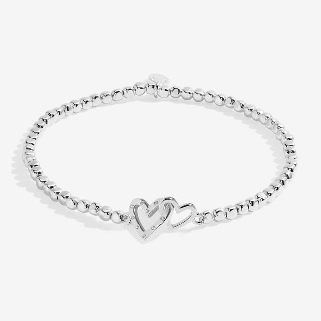 Silver beaded bracelet with interlinked heart charms for Mam