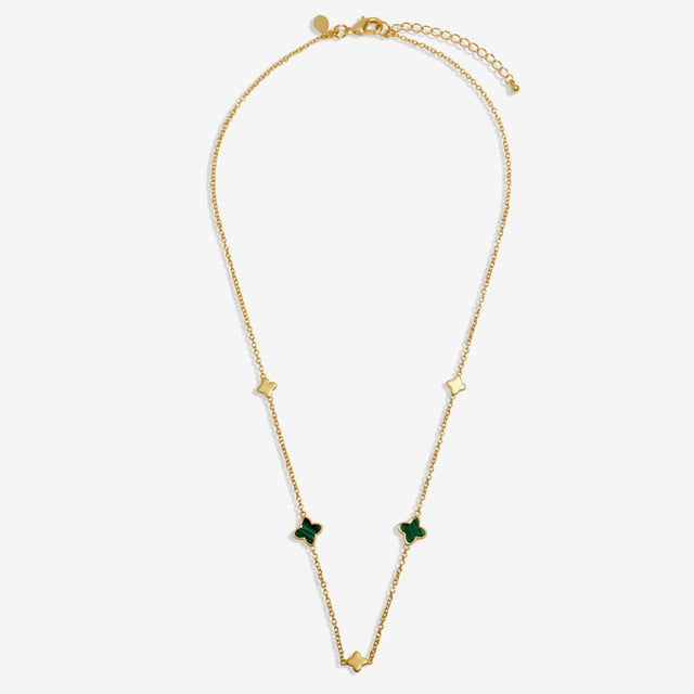 Clover gold necklace with green clover and gold details