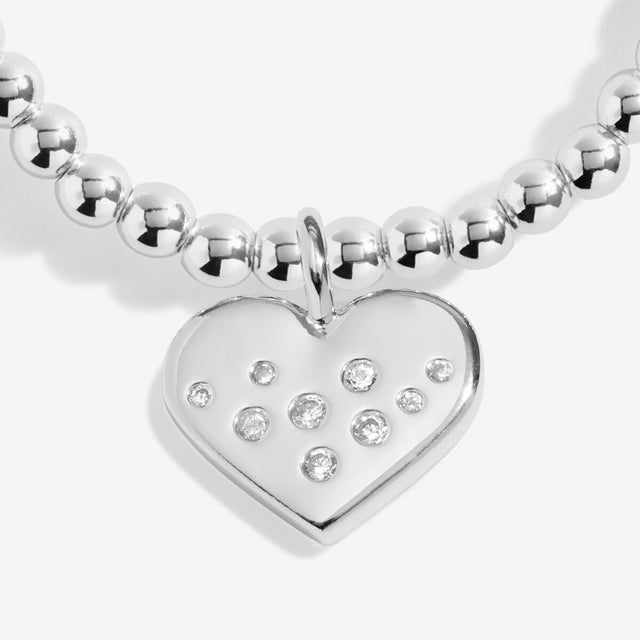 Close-up of heart charm on Joma Jewellery Confetti A Little 50th Birthday silver-plated bracelet