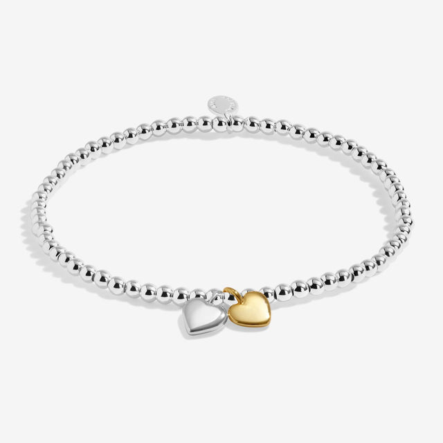 Silver beaded stretch anklet with mixed metal double heart charms