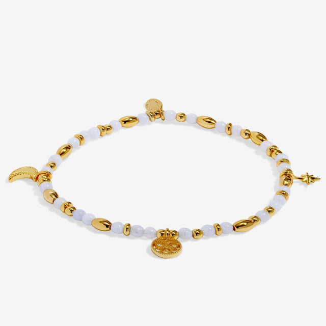 Joma Jewellery Dreamer gold beaded affirmation bracelet laid flat
