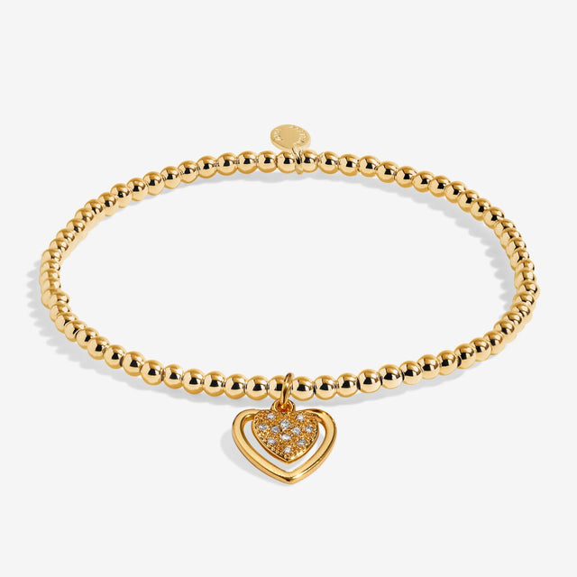 Gold plated beaded bracelet with sparkling heart charm