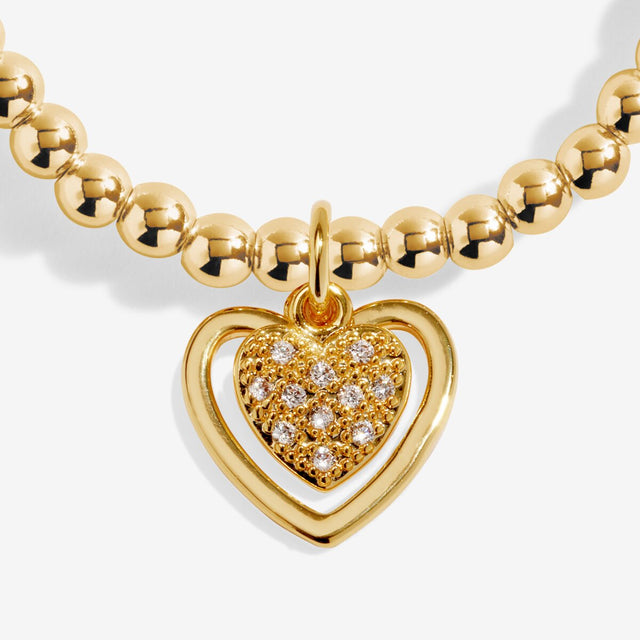 Close up of gold heart charm on First My Mum Forever My Friend bracelet