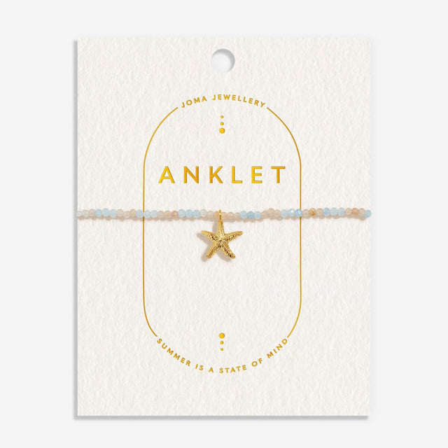 Joma Jewellery gold anklet with starfish charm on buttercream display card