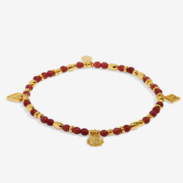 Joma Jewellery Happiness gold beaded affirmation bracelet laid flat