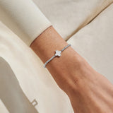Joma Jewellery A Little Happy Birthday silver bracelet worn on wrist