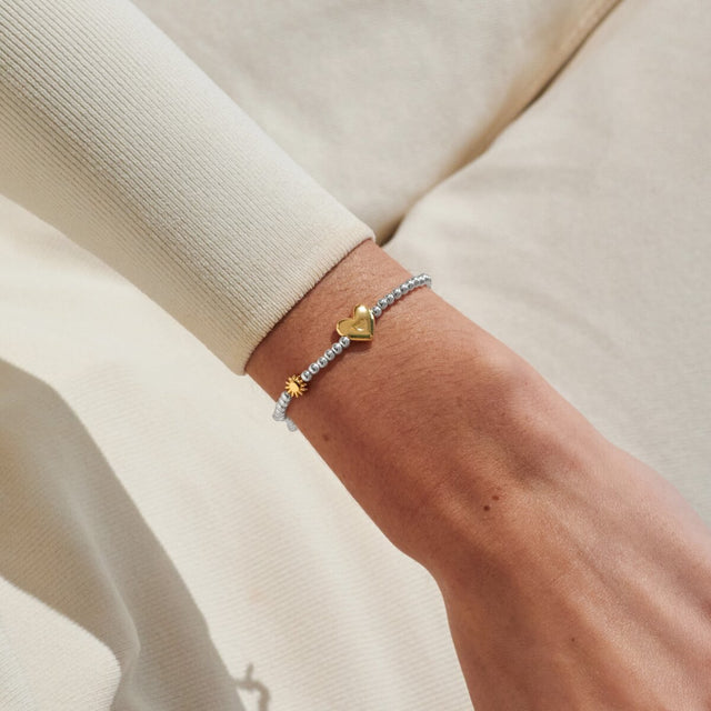 Joma Jewellery June birth month silver and gold-plated bracelet worn on wrist