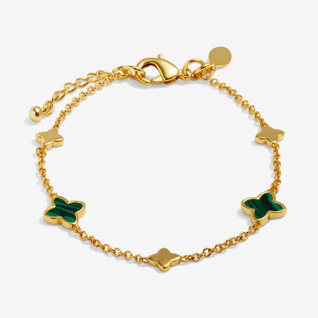 Gold clover bracelet with green clover motifs from Joma Jewellery