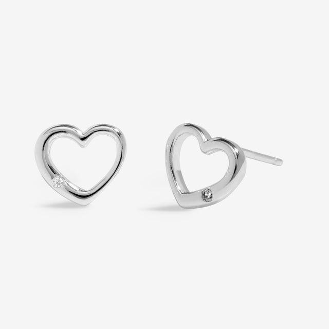 Silver heart stud earrings present for daughter front view