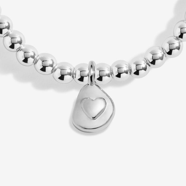 Teardrop charm detail on silver Lovely Friend charm bracelet