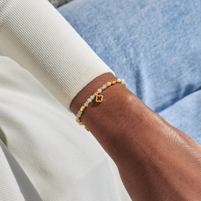 Joma Jewellery Luck gold affirmation bracelet worn on wrist