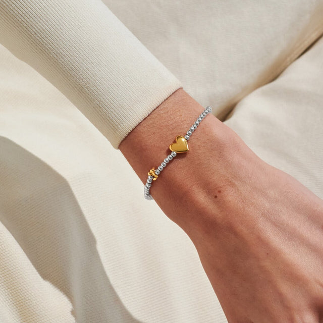 Joma Jewellery May birth month silver and gold-plated bracelet worn on wrist