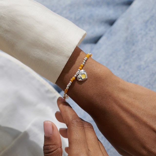 Joma Jewellery November yellow quartz birthstone bracelet worn on wrist